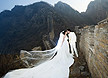 最新影楼资讯新闻-长城拍婚照 穿21斤10米大拖尾婚纱