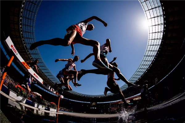 八届奥运摄影师用镜头定格体育的力与美、赛与情